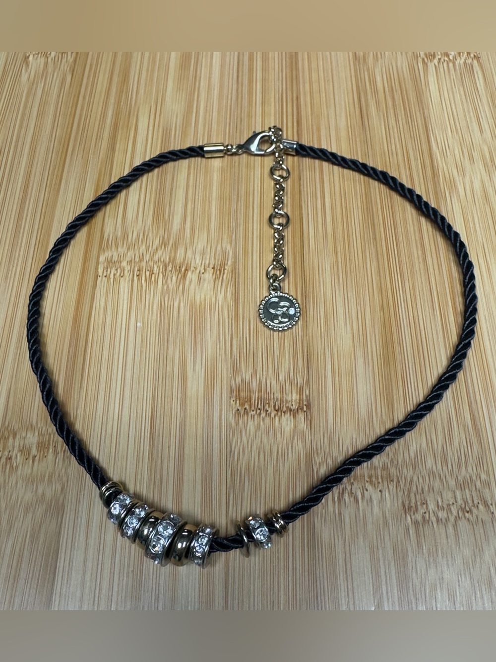 Retired Jessica Simpson black cord slide necklace
